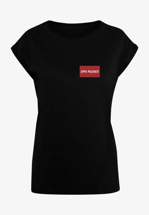 Black t-shirt with short sleeves, round neckline, featuring a red rectangular logo with white text "DIMA MAGHREB." Material appears soft.
