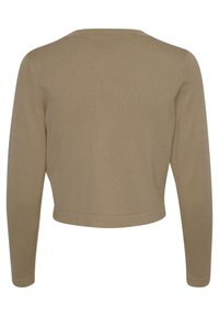 Suéter corto beige con mangas largas, textura acanalada y cuello redondo. Líneas limpias y diseño minimalista. Sin cierres visibles.