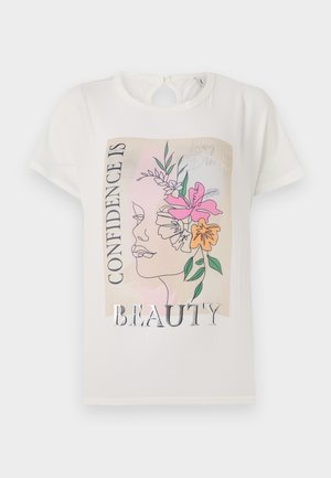 Valge T-särk, millel on graafiline disain, kus on kujutatud lilledega kaunistatud nägu ning tekst "ENESEKINDLUS ON ILU." Lühikesed varrukad, ümar kaelus.