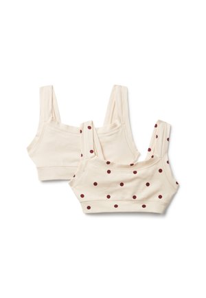 Zwei cremefarbene Baumwoll-Bralette-Tops, eines unifarben und eines mit kastanienbraunen Punkten, flach auf weißem Hintergrund ausgelegt.