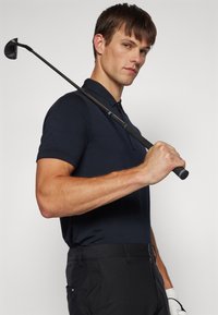 TravisMathew THE HEATER - Pólóing - black