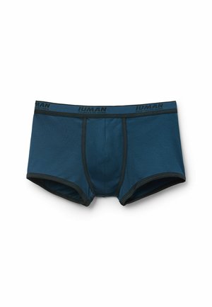 Tyrkysové pánské boxerky s kontrastním černým pasem, na kterém je značka "Iuman", vyrobené z hladké, pružné tkaniny.