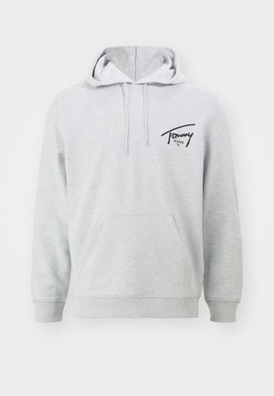 Hoodie in cotone grigio con tasca frontale, cappuccio con cordino e logo "Tommy Jeans" nero in alto a sinistra. Tessuto morbido, design informale.