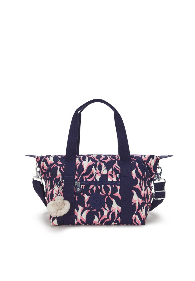 Red and navy patterned tote bag with dual handles, exterior pocket, adjustable shoulder strap, and a plush monkey keychain accent.