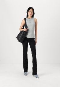 Marc O'Polo DENIM TROUSERS MID WAIST FLARED - Platėjantys džinsai - black