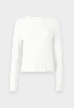 White sweater featuring long sleeves, a round neckline, and a textured knit pattern with small diamond cutouts. Clean silhouette, ribbed cuffs.
