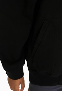 Bershka Tröja med dragkedja - black