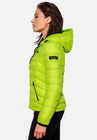 Green puffer jacket with hood, featuring a quilted design, zippered pockets, and contrasting black accents. Brand logo visible on sleeve.
