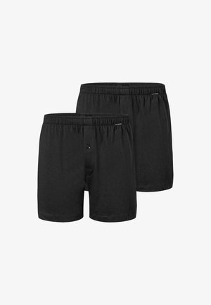 Black cotton boxer shorts, featuring an elastic waistband, button fly, and soft texture. Two pairs displayed, standard fit.