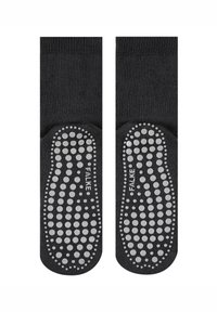 Černé ponožky s gumovými protiskluzovými tečkami na podrážkách, s logem "FALKE". Hladká textura a jednotný design po celém povrchu.