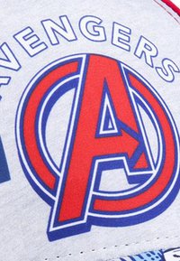 Gray fabric featuring the "Avengers" logo, with a large red and blue stylized letter "A" and circular accents.