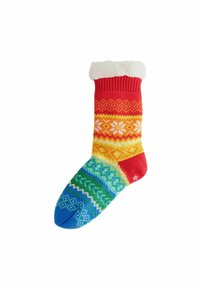 Stricksocke mit bunten Mustern; Abschnitte in Rot, Orange, Gelb, Grün und Blau; weißer Kunstfellbund; Sternakzent an der Zehe.