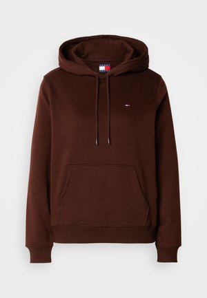 Brūna kapuce, kas izgatavota no kokvilnas maisījuma auduma. Iespējas ietver kengura kabatu, auklu kapuci un mazu logotipu uz krūtīm. Stiepjamās piedurknes.