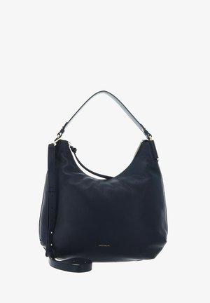 Dark blue leather shoulder bag with gold zipper and adjustable strap, featuring "Coccinelle" brand logo in gold lettering.