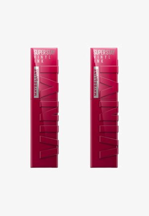 Emballage de Maybelline SuperStay Vinyl Ink en rose vif. Présente un design angulaire, une écriture en relief et une finition brillante. Deux tubes identiques exposés.