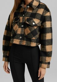 Bershka Tunn jacka - brown