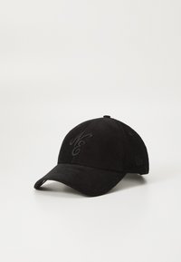 Black corduroy cap with a curved brim, embroidered logo on the front, and textured fabric. Features six panels and an adjustable strap.