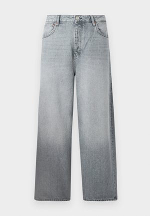 Jeans de pierna ancha en gris claro con un efecto deslavado, con cierre de botón y cremallera, diseño de cinco bolsillos y costuras en contraste.