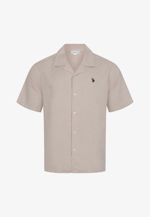 Beige short-sleeve button-up shirt with open collar and small black embroidered polo player logo on the left chest.