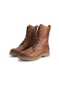 Bottines en cuir marron avec une finition lisse, à lacets sur le devant, bout rond et semelle en caoutchouc. Comprend des œillets en métal et une languette à l'arrière.