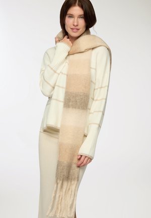 Sciarpa di lana beige con una texture morbida, caratterizzata da righe orizzontali in varie tonalità di beige e marrone, rifinita con bordi frangiati.