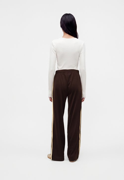 adidas FIREBIRD LOOSE - Tracksuit bottoms - aurora coffee/almost yellow — photo 3