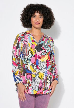 Blouse à manches longues multicolore avec des designs abstraits en rose, jaune et bleu, avec un col en V et des poignets froncés. Texture lisse.