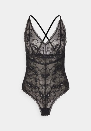 Bodysuit de encaje negro con estampado floral, bordes festoneados, escote en V y tirantes cruzados en la parte posterior. Textura suave y diseño ajustado.