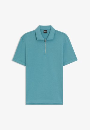 Turkis polo shirt med en lynlås krave, kortærmede, og et minimalistisk design. Lavet af et glat stof med en subtil tekstur.