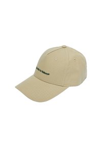 Beige cap with a textured pattern, curved brim, and embroidered green text reading "Subscribe to Nature®." Features ventilation eyelets.