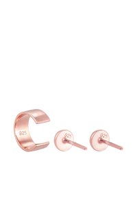 Rosaguld smykkesæt bestående af en cuff-ring og matchende stud-ørestikker med en elegant, glat finish og et 925 sølvstemplet.