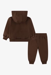 Nike Sportswear FUTURA WRAP PANT UNISEX SET - Dresside alumine osa - cacao wow