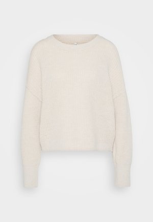 Cream, cropped knit sweater with a round neckline, drop shoulder seams, and ribbed cuffs. Soft texture with a loose fit and minimal design.