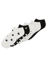 Quattro paia di calzini alla caviglia in bianco e nero. I modelli includono pois e piccoli punti, realizzati in una morbida miscela di cotone.