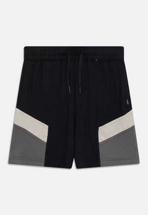 Sorte shorts med elastisk talje og snøre, med grå og beige farveblokpaneler på hvert ben.