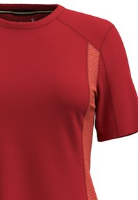Red athletic shirt featuring short sleeves, a round neckline, and mesh side panels for enhanced breathability and texture contrast.