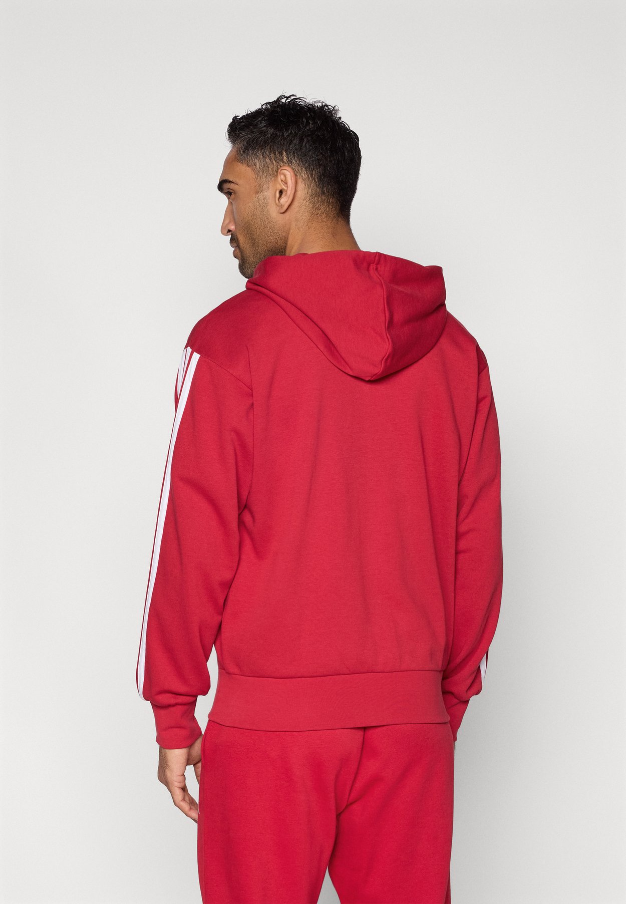 ESSENTIALS THREE STRIPES FRENCH TERRY FULLZIP