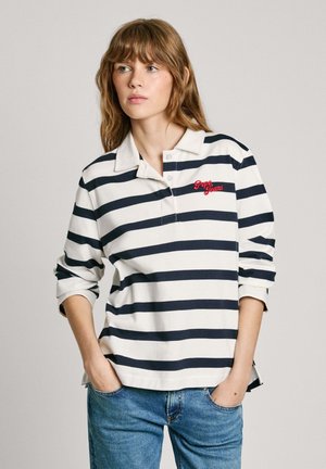 White and navy striped polo shirt with a collar, three buttons, and red "Pepe Jeans" embroidery on the left side. Worn with blue jeans.