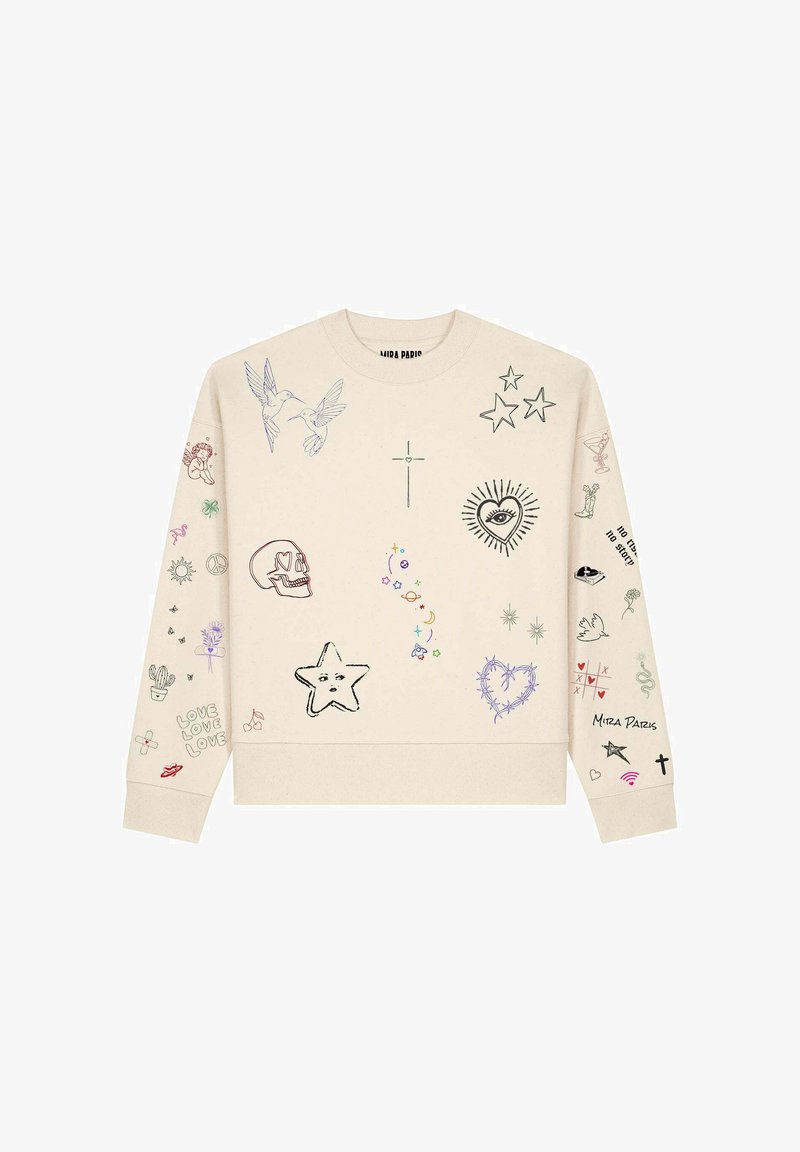 Sweat-shirt beige avec divers dessins colorés, dont des oiseaux, des étoiles, un crâne, un cœur avec un œil, et des symboles sur le devant et les manches.