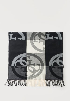 Écharpe à carreaux noir, gris et blanc avec de grands motifs circulaires de logos et des bords frangés, étalée à plat sur une surface blanche.