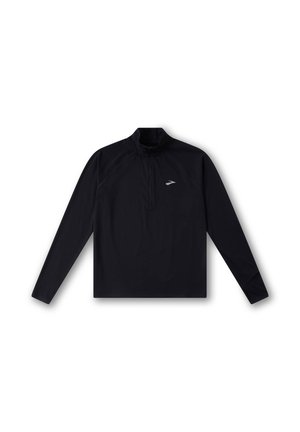 Black long-sleeve athletic shirt with a quarter-zip collar, smooth texture, and reflective logo on the left chest, designed for comfort and performance.