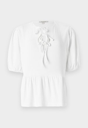 White blouse with a round neckline, short puffed sleeves, and a drawstring tie at the front. Features a textured woven fabric and peplum hem.