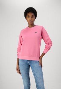 Lacoste Sportska majica - reseda pink