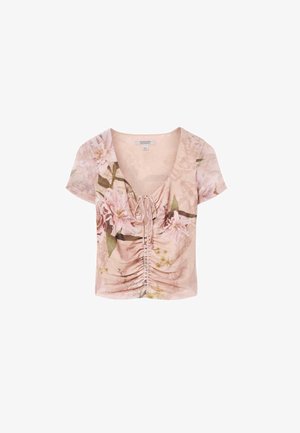 Blusa rosa de manga corta con fruncido, estampado floral, escote en V y detalle de lazo en el centro delante.