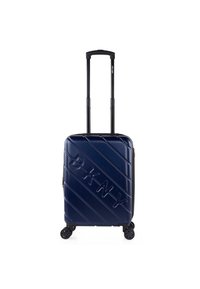 Maleta rígida de color navy con surcos diagonales, logotipo "DKNY" en relieve, mango retráctil y cuatro ruedas giratorias para una fácil movilidad.