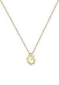 Goldkette mit einem herzförmigen Anhänger, der ein kleineres Herz-Ausschnitt hat, montiert auf einer strukturierten Kette. Einfaches Design und polierte Oberfläche.