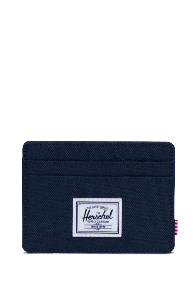 Navy cardholder made of durable fabric, featuring four card slots, a white label logo, and a striped accent on the side.