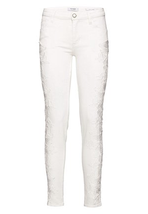 Jean slim-fit blanc avec broderie florale le long des jambes extérieures, bouton à l'avant et passants de ceinture.
