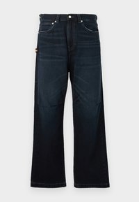 Dark blue straight-leg jeans with classic five-pocket design, belt loops, and subtle faded details at front and knees.