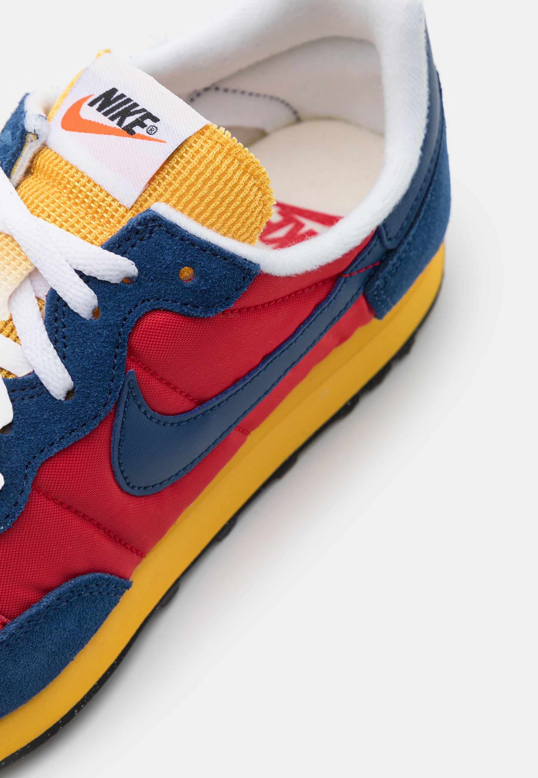 nike red and blue trainers